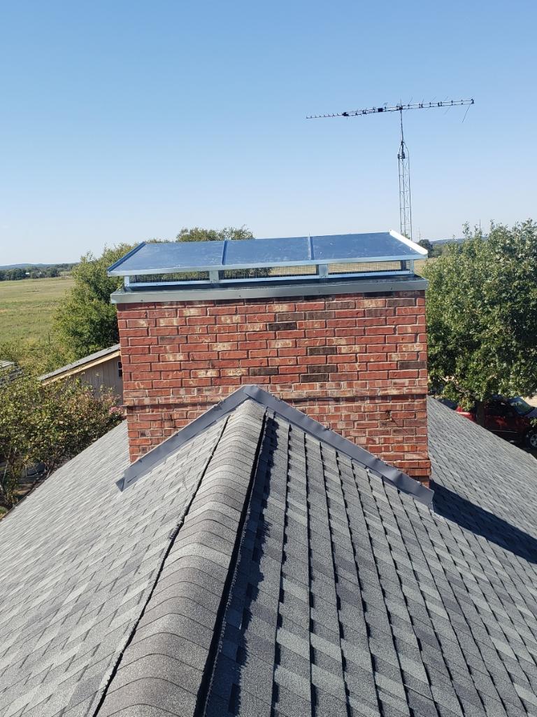 Completed shingle roof replacement in Arlington TX by Guarantee Roofing